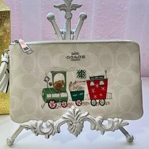 Coach Signature Train Double Zip Clutch